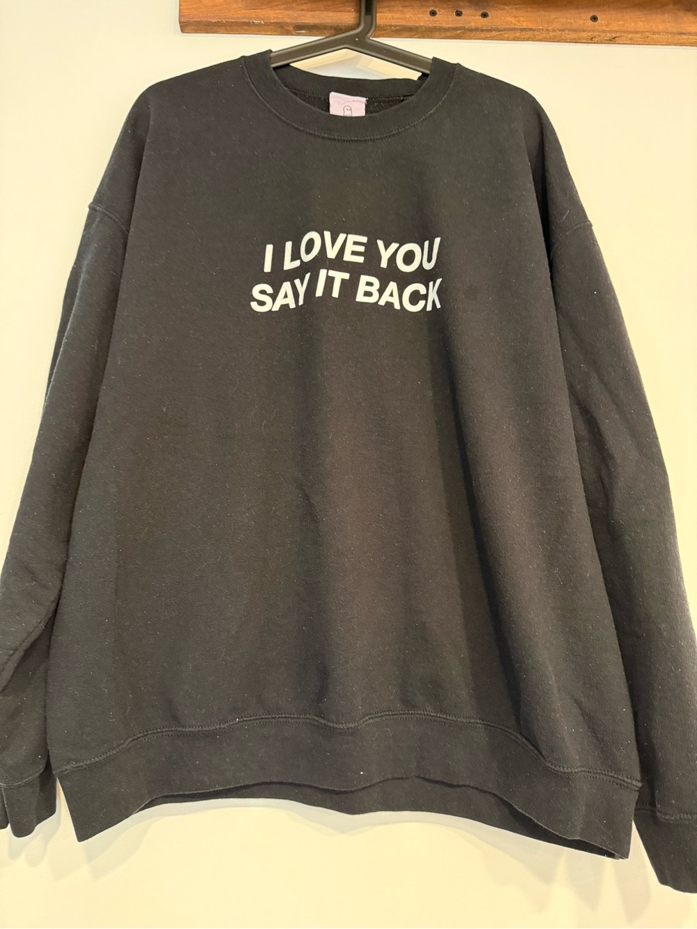 LONELY GHOST Black Crewneck Sweater with White Text Graphic